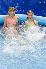 Image showing Children in paddling pool