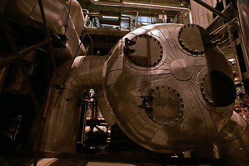 Image showing Pipes, tubes, machinery and steam turbine at a power plant