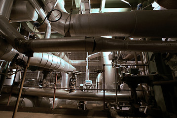 Image showing Equipment, cables and piping as found inside of a modern industr