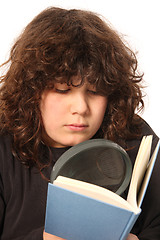 Image showing boy reading a book with lens