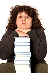 Image showing boy and many books