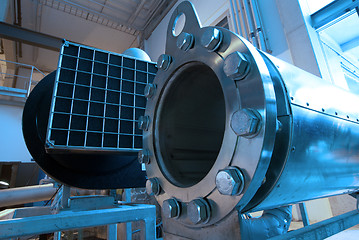 Image showing Pipes, tubes, machinery and steam turbine at a power plant
