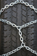 Image showing tire and snow-chain