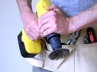 Image showing Handy man with power tool