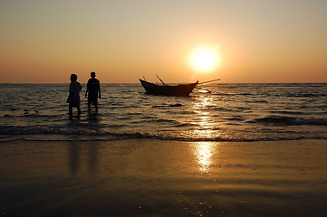 Image showing Fishermen at Sunset