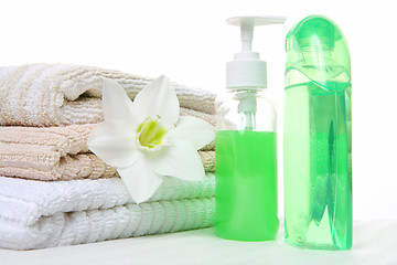 Image showing shampoo, towel and aromatic oil