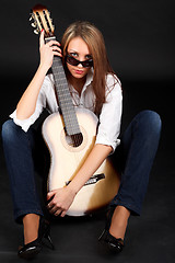 Image showing Woman with guitar.