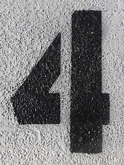 Image showing Number four on asphalt