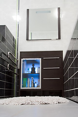 Image showing Toiletries in bathroom cabinet