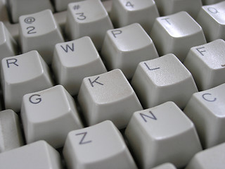 Image showing Computer keyboard with muddled keys.