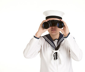 Image showing young sailor with binoculars isolated white background