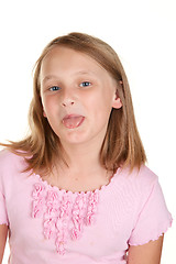 Image showing young girl poking out tongue