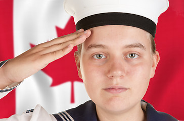 Image showing young sailor saluting isolated white background