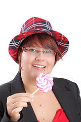 Image showing Young woman with lollipop
