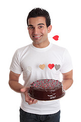 Image showing Valentine Fun- Male with chocolate heart cake 