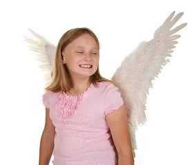 Image showing sneaky young girl with angel wings