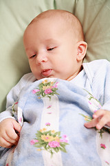 Image showing Adorable newborn in bed