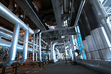 Image showing Pipes, tubes, machinery and steam turbine at a power plant