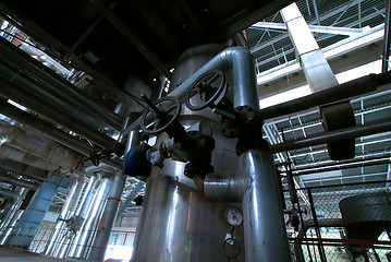 Image showing Equipment, cables and piping as found inside of a modern industr