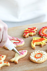 Image showing Decorating cookies