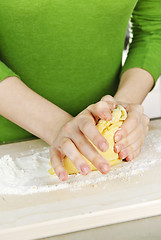 Image showing Hands kneading dough