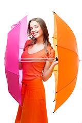 Image showing Young woman with color umbrellas