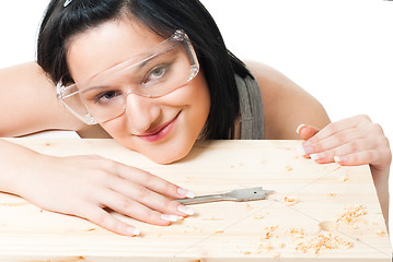 Image showing Woman with drill for wood