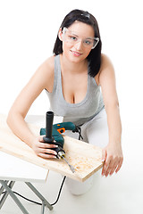 Image showing Positive woman with drill