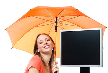 Image showing Girl an computer under umbrella