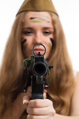 Image showing Woman look at camera through gun sight