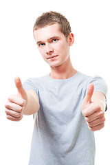 Image showing Positive young man with thumbs up