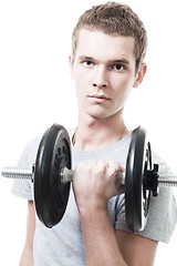 Image showing Young man lift weight in gym
