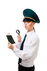 Image showing Customs control worker carefully check documents