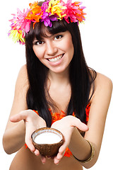 Image showing Woman in costume of flowers offer coconut milk