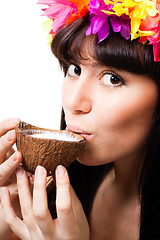 Image showing Face of a young woman drink coconut milk