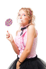 Image showing Funny school girl with bubblegum and lolipop