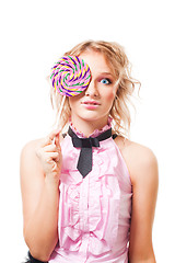 Image showing woman with lollipop in pink dress