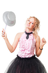 Image showing Blond magitian woman play with hat and magic wand