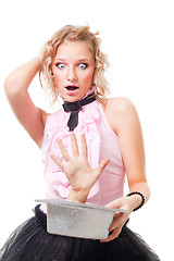 Image showing woman illusionist perform scary trick