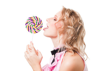 Image showing Blond girl lick lollipop