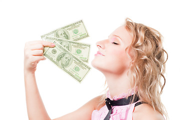 Image showing Beautiful blond woman smell money