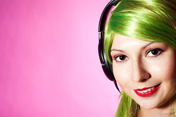Image showing Happy woman listen music