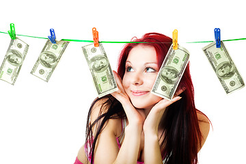 Image showing Shocked woman with cash wash money