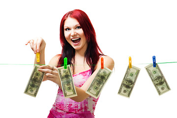 Image showing Shocked woman with cash wash money