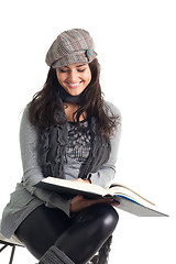 Image showing Happy young woman read book