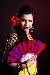 Image showing Beautiful gypsy woman with fan