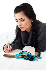 Image showing young woman write memories