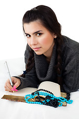 Image showing Girl with write notes