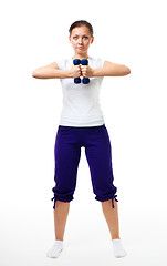 Image showing Woman stand with dumbbells