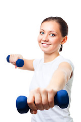 Image showing Positive young woman with dumbbells